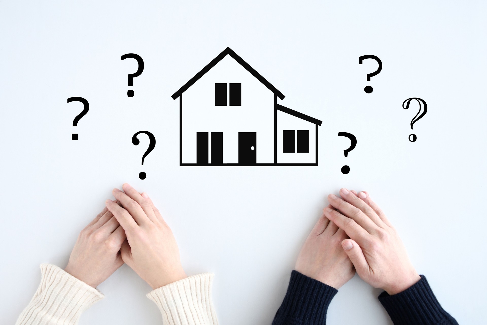 Image of a couple with questions about building a house or buying a home